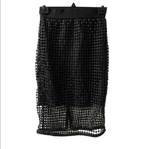 Ann Taylor Black Fishnet MIDI Skirt 00P elastic waist
Condition 9/10 no flaws